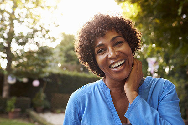 mature woman outside smiling